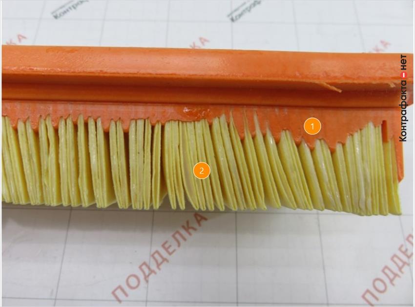 1. Подтеки полиуретанового материала между ламелями. | 2. Избыток клея между слоями бумаги.