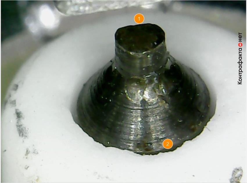 1. Центральный электрод заменен железоникелевым. | 2. Колотые края керамического изолятора.