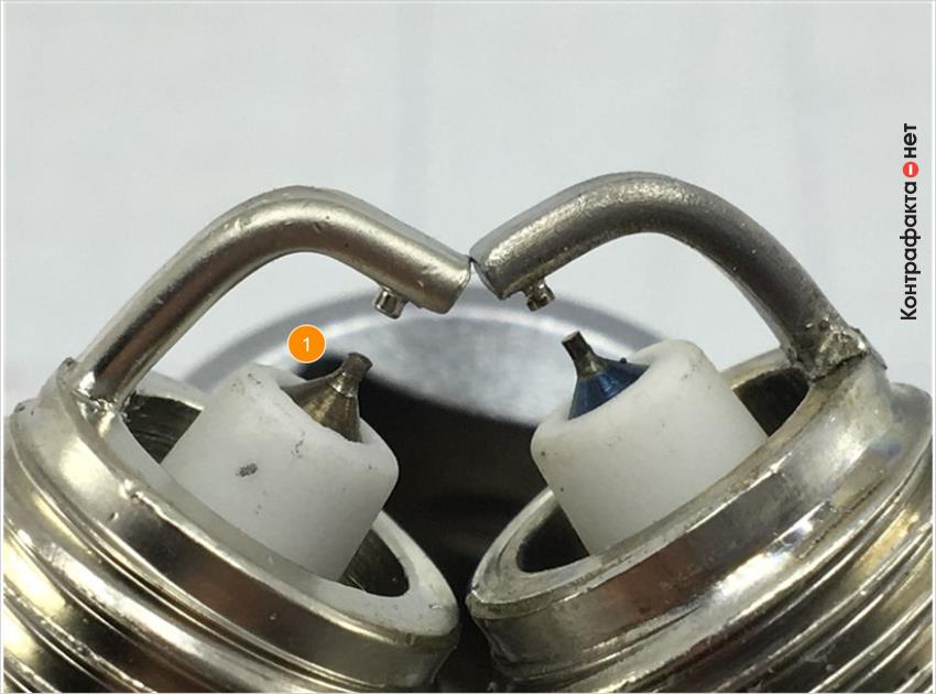 1. Отличается центральный электрод, цветовой оттенок металла сердечника не соответствует оригиналу.