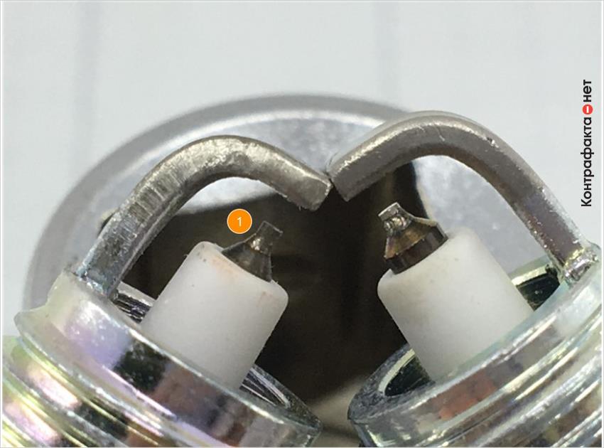 1. Отличается центральный электрод, цветовой оттенок металла сердечника не соответствует оригиналу.