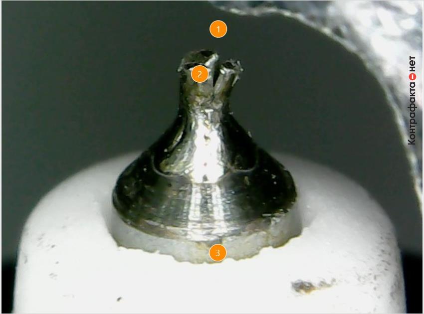 1. Дефекты центрального электрода. | 2. Иридиевый наконечник заменен железоникелевым. | 3. Колотые края керамического изолятора.