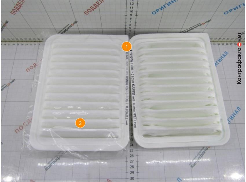 1. Маркировочные обозначения на противоположной стороне корпуса фильтра. | 2. Фильтр упакован в дополнительный полиэтиленовый пакет.