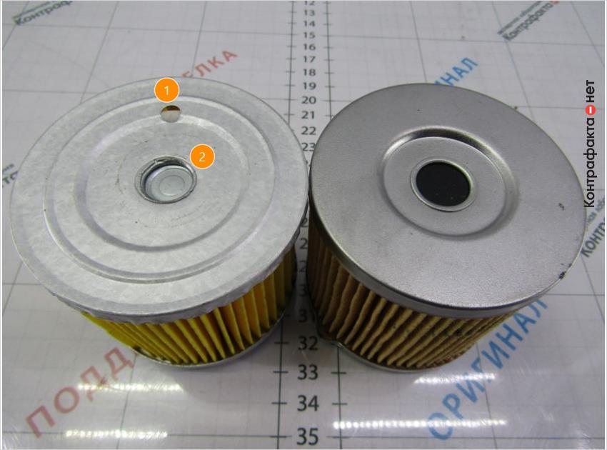 1. Выполнено лишние отверстие. | 2. Металлический обводной клапан, в оригинале резиновый.