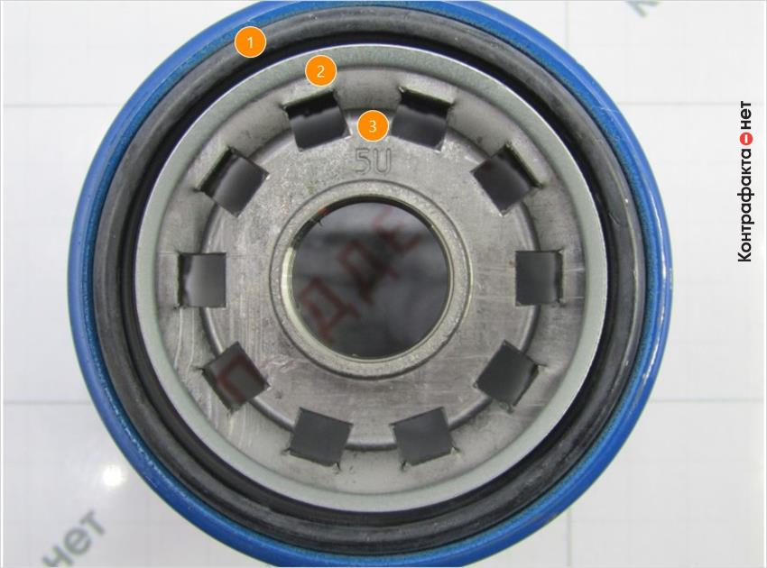 1. Конструктивные отличия. | 2. Отверстия прямоугольной формы. | 3. Штамп маркировки не соответствует оригиналу.