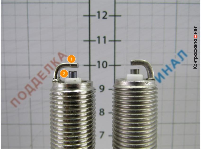 1. Разные формы изгиба бокового электрода. | 2. Центральный электрод большей длинны.