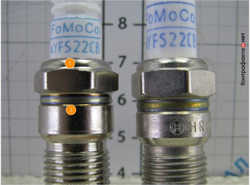 1. Гайка большей ширины. | 2. Не нанесен логотип производителя.