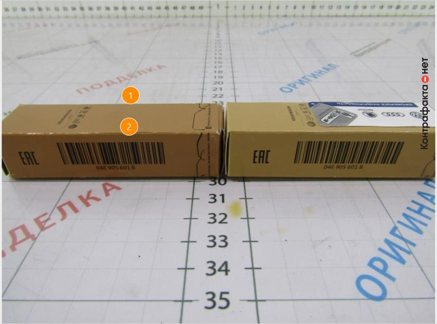 1. Отсутствует защитный стикер с уникальным кодом. | 2. Более темный оттенок коробки.
