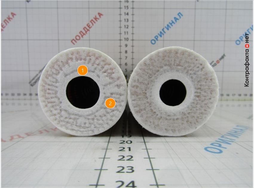 1. Выходное отверстие большего диаметра. | 2. Войлочный корпус не полностью приклеен к ламелям.